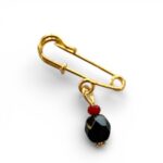 Gold-Tone Safety Pin with Black & Red Bead Charm