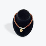 Brown Bead Necklace with White Accents and Coin Pendant