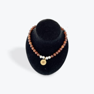 Brown Bead Necklace with White Accents and Coin Pendant