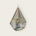 La Virgen de la Caridad del Cobre in Geometric Glass Hanging Frame